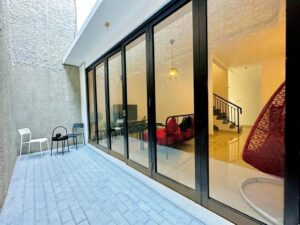 Modern patio seating area at nuansa swadarma residence