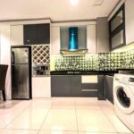 Mesin cuci apartemen 2br sophisticated surabaya di via tower ciputra world